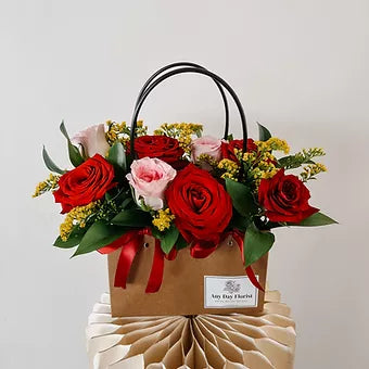Any Day FloristProduct Description
Roses are more than just an anniversary gift, they're an expression of your feelings. When you want to send your loved ones roses, there's no neeRosie Roselle Bloom Bag