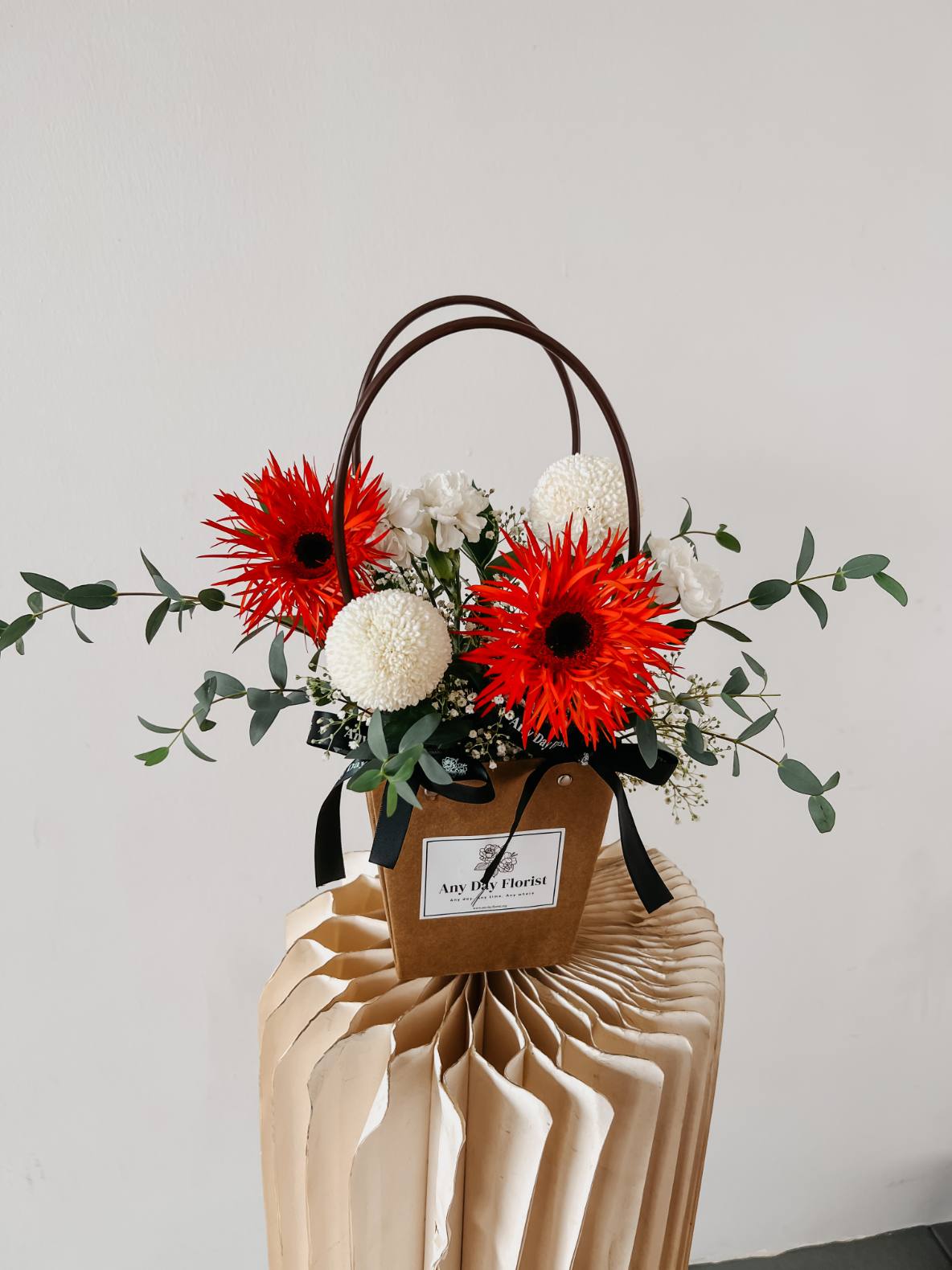 Any Day FloristPerfect Ocassion for: Birthday, Monthsary, I'm Sorry
*Do note that fresh flowers, fillers &amp; foliage are seasonal and are subjected to changes based on availabiliClarissa | Bloom Bag Arrangement