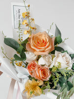 Any Day FloristA gift of love is always a gesture of appreciation, so send your loved ones this lovely bouquet. A mix of Coral and White roses, they will surely love the sweet and Peachy Passion | Hand Bouquet of the Week