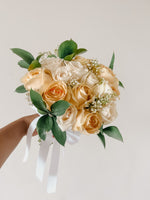 Any Day FloristChampagne is the drink of celebration and a bouquet of 7 champagne roses with white vendela roses is the perfect way to celebrate your wedding. The bouquet can be orChampagne | Bridal Bouquet