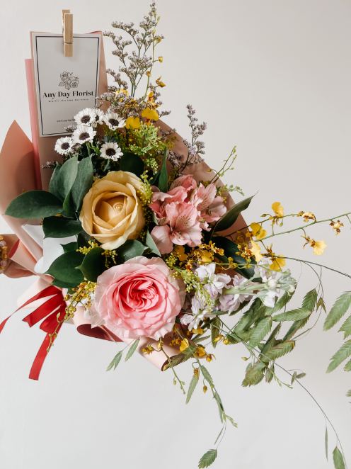 Any Day FloristWhen Spring finally arrives, you want to keep the seasons beauty close to your heart. That's why we created these stunning roses which are perfect to send as a momenSpring Beauty | Hand Bouquet of the Week