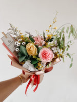 Any Day FloristWhen Spring finally arrives, you want to keep the seasons beauty close to your heart. That's why we created these stunning roses which are perfect to send as a momenSpring Beauty | Hand Bouquet of the Week