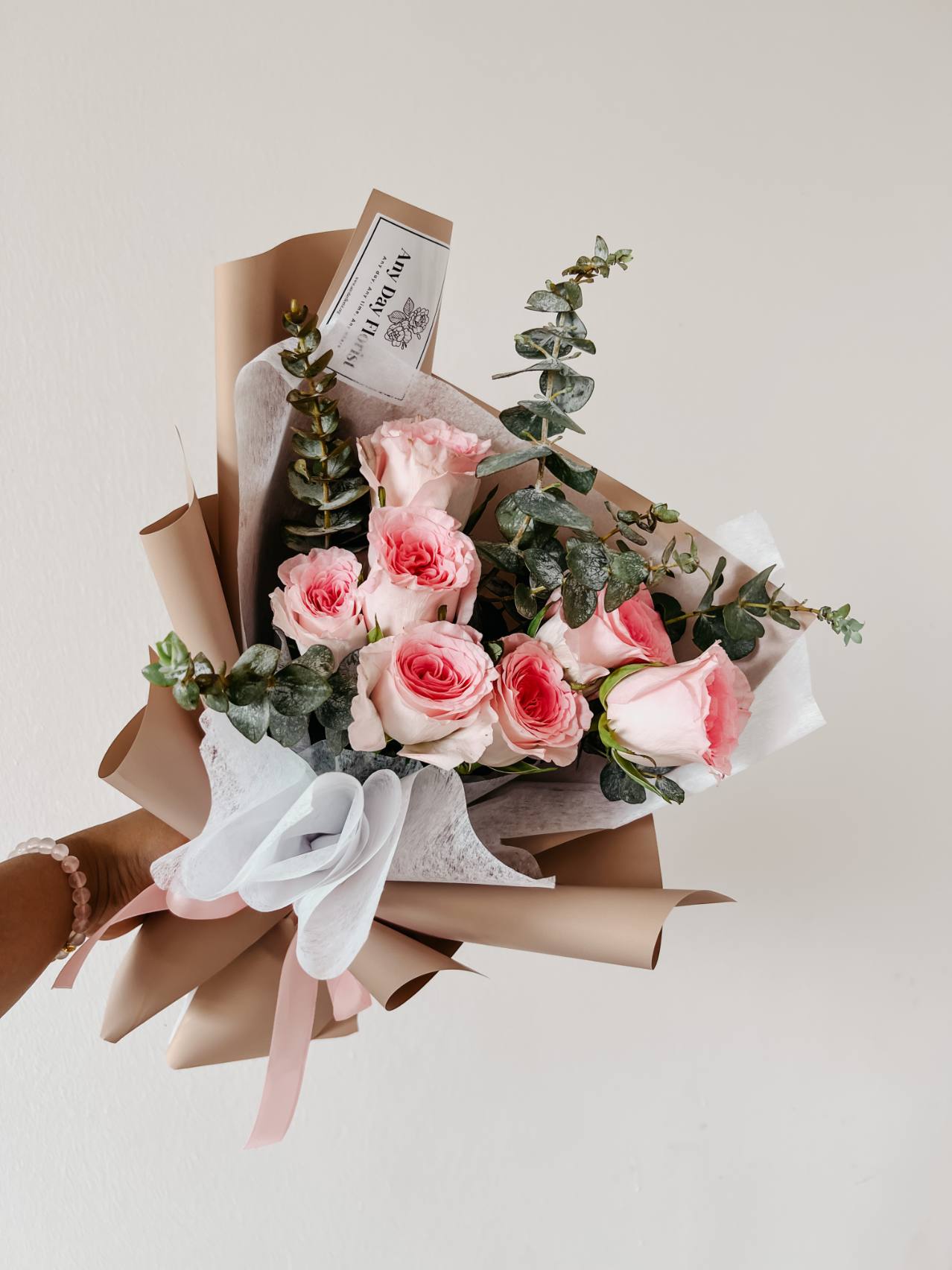 Any Day Florist
A rose by any other name would smell as sweet  This beautiful 8 pink roses' bouquet is perfect for any occasion. The soft, colorful flowers are arranged in a vase fRoselle Bouquet | 8 Pink Roses Bouquet