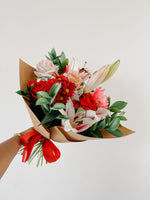 Any Day FloristAnother mother's favorite! With a combination of lilies and roses you can never go wrong with this bouquet! Symbolizes beauty and respectful love to your reciever :)Lilian Beau | Bouquet of Lilies