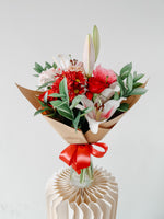 Any Day FloristAnother mother's favorite! With a combination of lilies and roses you can never go wrong with this bouquet! Symbolizes beauty and respectful love to your reciever :)Lilian Beau | Bouquet of Lilies