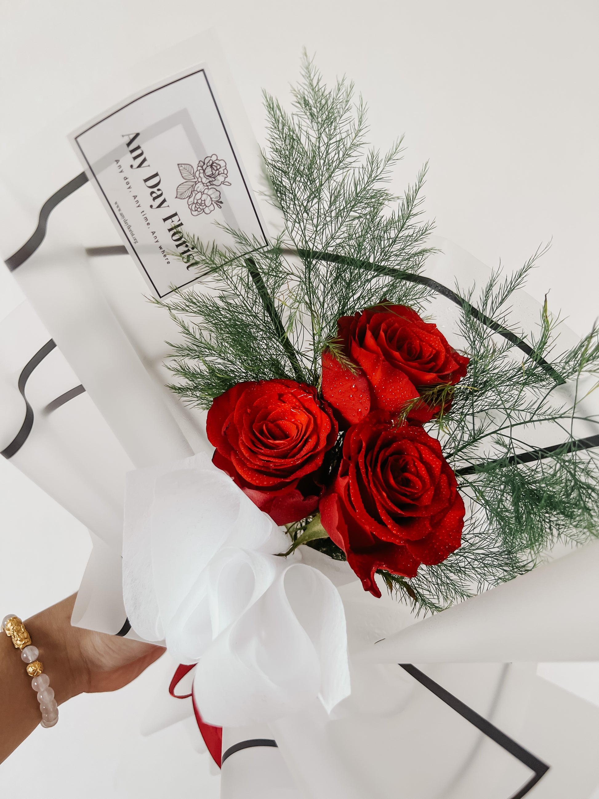 Any Day Florist​​​​​​
​​​​​​'I love you Fresh Flower Bouquet'
A stunning minimalistic 3 Stalk Rose bouquet will bring joy and smiles for your dear ones.

Red Roses symbolizes love I love you Bouquet | 3 Stalk Red Roses