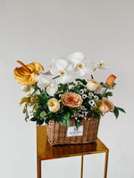 Any Day FloristSend your loved one this beautiful mixed flora arrangement consisting of Phalaeposis and Roses in a basket.Oriental | Basket Arrangement