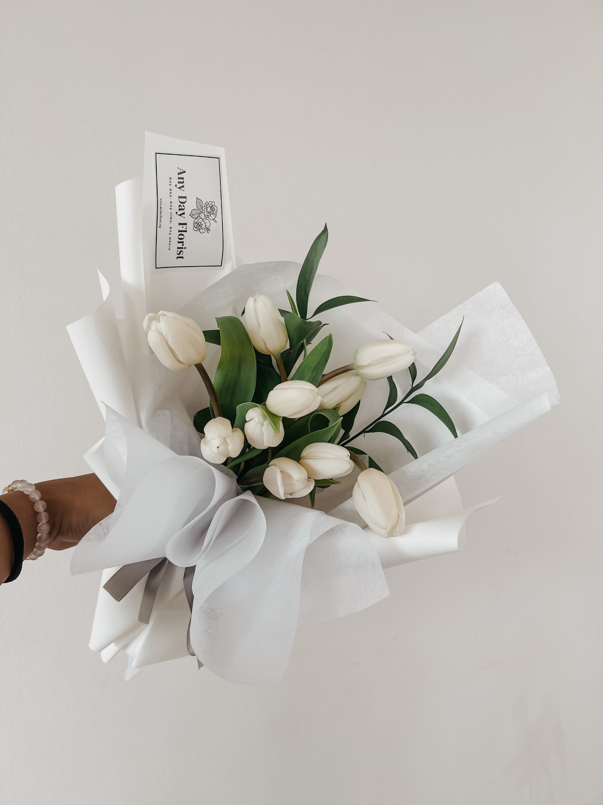 Any Day FloristTulips are a common flower seen at funerals as a way to say "I'm sorry" or "My condolences.". In addition, they are a symbol of purity, honor, and holiness, making tWhite Tulips Bouquet