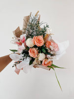 Any Day FloristBeautiful combinations of lilies from holland and garden roses perfect gift for all the mothers out there!
*Please note that our selection of flowers may differ sligLilian Rosie | Shimmer Coral Roses with Lilies