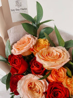 Any Day FloristBouquet inspired for the love you met in summer! With a beautiful combination of orange, red, champagne roses bringing back the day you've met in summer... Such a roSummer love | Roses Bouquet