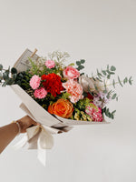 Any Day FloristThe XL Hand bouquet of the day flower is selected from a mixture of flowers that are freshest and in season. The florist chooses different flowers daily to create a Hand Bouquet of the Day XL
