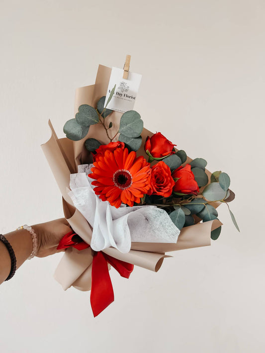Red Gerberas bouquet for anniversary curated by Any Day Florist